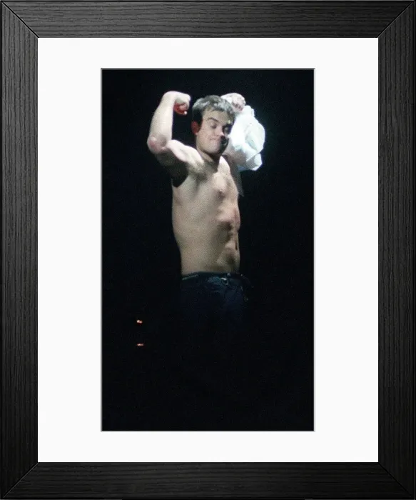 Framed Print : Robbie Williams in concert SECC Glasgow February 1999 takes of shirt shows off bare chest Framed Print : Robbie Williams in concert SECC Glasgow February 1999 takes of shirt shows off bare chest