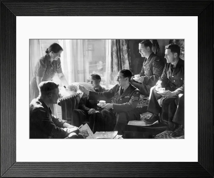 Framed Print : Crew and officers of the RAF enjoying a cup of tea from their host in Blackpool during Framed Print : Crew and officers of the RAF enjoying a cup of tea from their host in Blackpool during