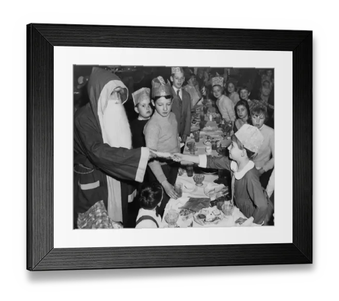 Framed Print : Father Christmas, arriving with a present for each of the 70 children
