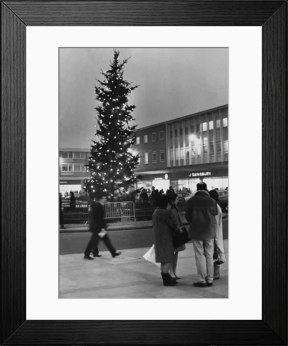 Framed Print : The Christmas scene in Mell Square, Solihull, with the illuminated tree dominating Framed Print : The Christmas scene in Mell Square, Solihull, with the illuminated tree dominating