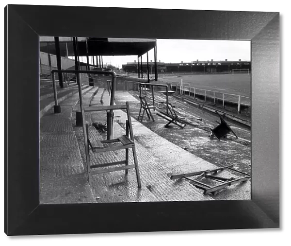 Newport Football Club. Terraces with grass, weeds and broken chairs