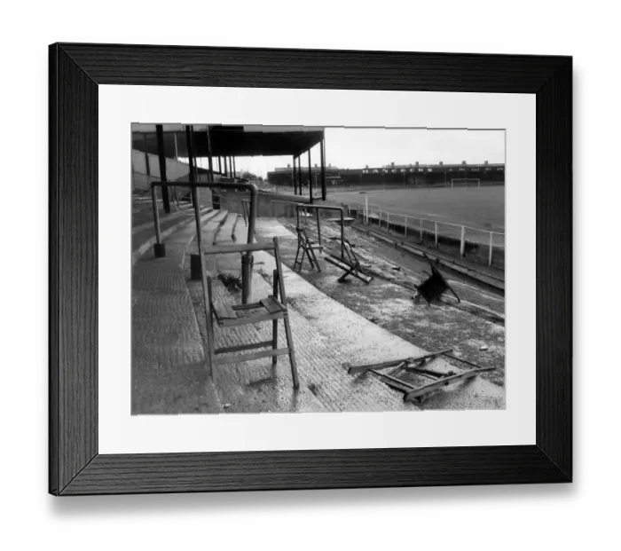 Framed Print : Newport Football Club. Terraces with grass, weeds and broken chairs Framed Print : Newport Football Club. Terraces with grass, weeds and broken chairs