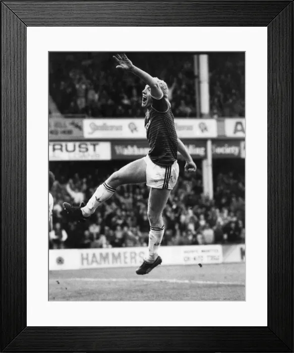 Framed Print : Frank McAvennie of West Ham United celebrates a goal. November 1985 P035461 Framed Print : Frank McAvennie of West Ham United celebrates a goal. November 1985 P035461