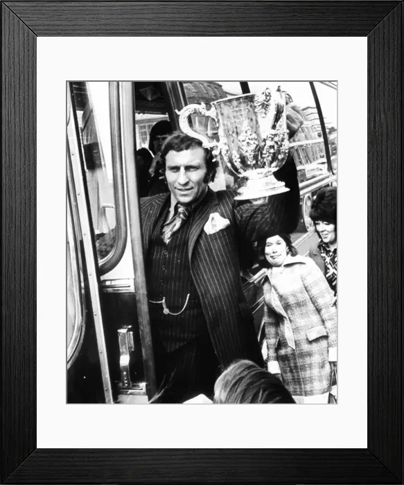 Framed Print : Footballer Mike Bailey of Wolverhampton Wanderers holds up the League Cup trophy to