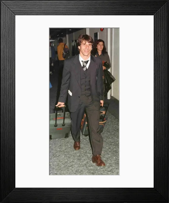 Framed Print : Chelsea and Italy footballer Gianfranco Zola arriving at Heathrow airport after England Framed Print : Chelsea and Italy footballer Gianfranco Zola arriving at Heathrow airport after England
