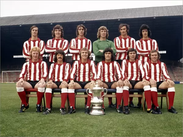 The Sunderland FA Cup winning team pose with the trophy at their Roker Park ground