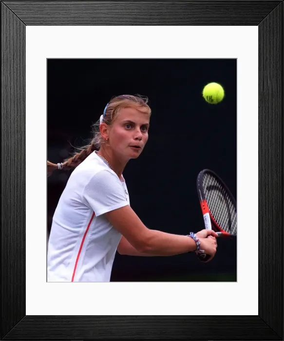 Framed Print : Jelena Dokic playing Mary Pierce at Wimbledon June 1999