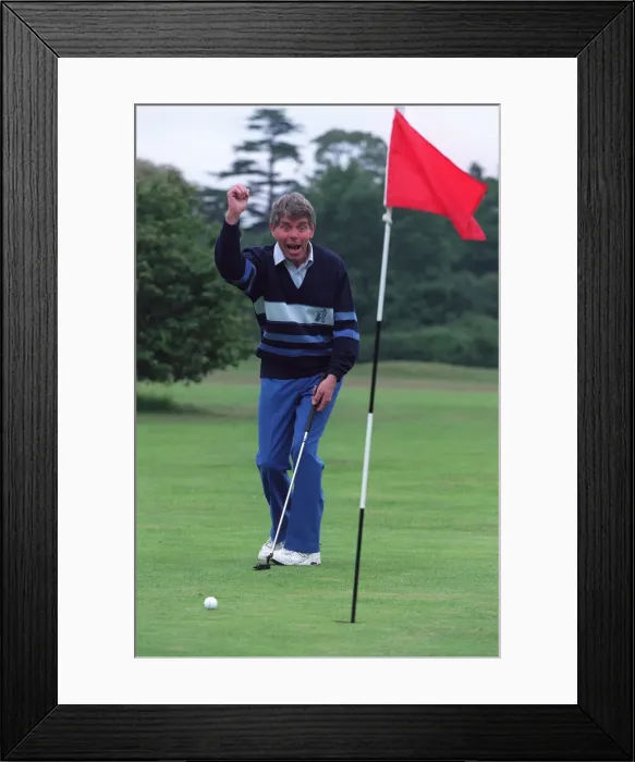 Framed Print : George King celebrates his scratchcard jackpot on the golfcourse after he Framed Print : George King celebrates his scratchcard jackpot on the golfcourse after he