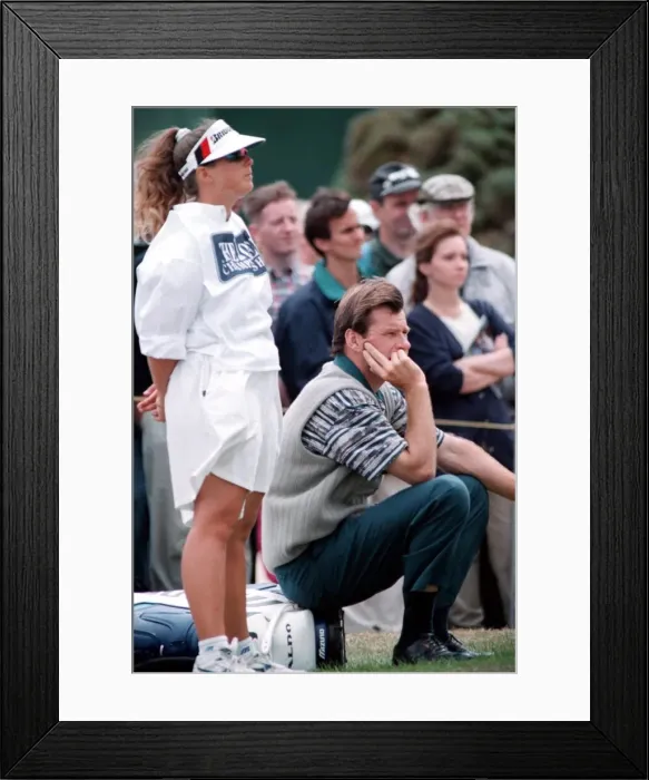 Framed Print : Nick Faldo sits down on his golf bag during his 74 in the first round of the British Open