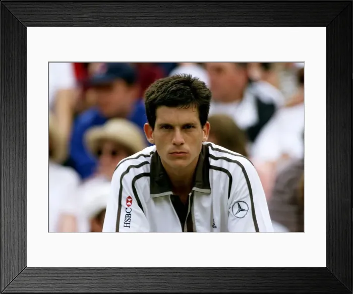 Framed Print : Tim Henman looks dejected after losing to Pete Sampras in the mens single Framed Print : Tim Henman looks dejected after losing to Pete Sampras in the mens single