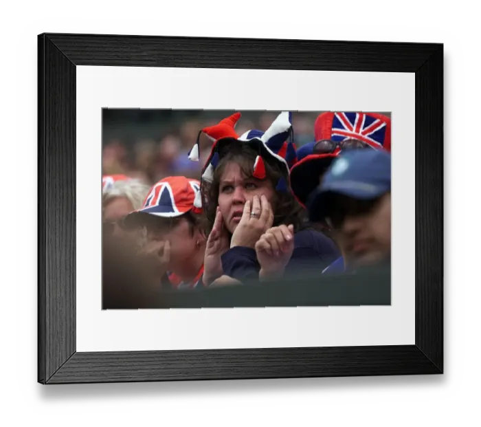 Framed Print : Tim Henman fan watches Tim on centre court during the match against Jim Courier Framed Print : Tim Henman fan watches Tim on centre court during the match against Jim Courier