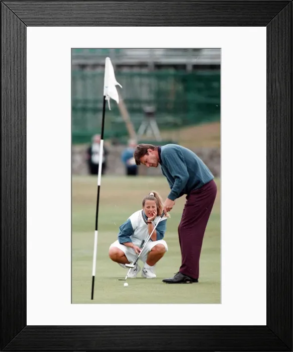 Framed Print : Nick Faldo practising his putting during practice round for the British Open Golf