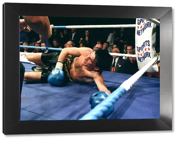 Michael Brodie versus Wilson Docherty November 1997 Wilson Docherty lies on canvas
