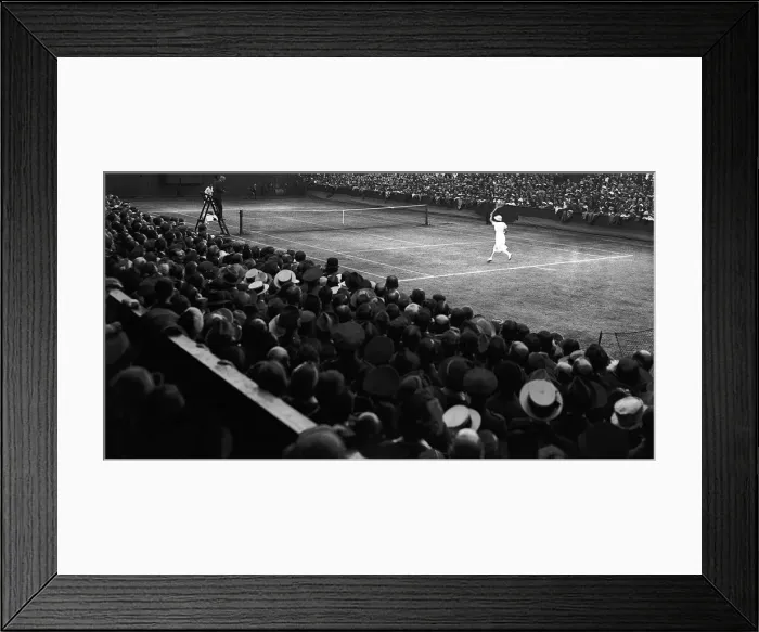 Framed Print : Championship tennis at Wimbledon - Miss Suzanne Lenglen in play on Centre Court Framed Print : Championship tennis at Wimbledon - Miss Suzanne Lenglen in play on Centre Court