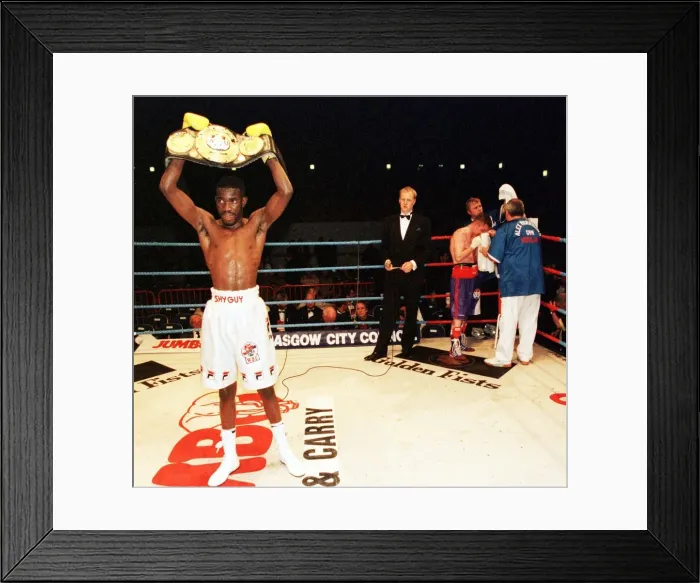Framed Print : Cassius Baloyi lifts the WBU featherweight championship belt June 1999 Framed Print : Cassius Baloyi lifts the WBU featherweight championship belt June 1999