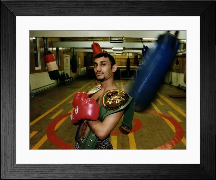 Framed Print : Prince Naseem Hamed in Sheffield gym with the WBC & IBO title belts looking smug proud