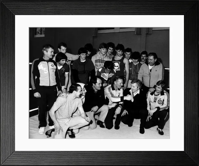 Framed Print : Jim watt playfully spars with Dick McTaggart as they and other boxers attend a training Framed Print : Jim watt playfully spars with Dick McTaggart as they and other boxers attend a training