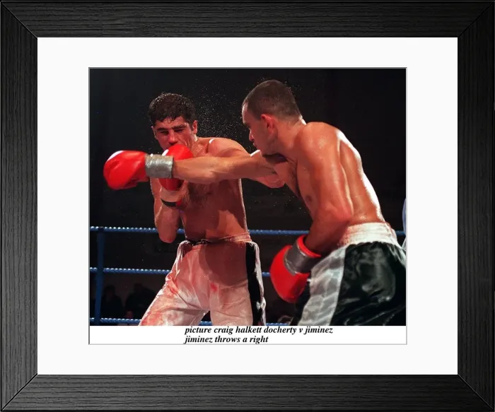 Framed Print : Daniel Jiminez of Puerto Rico and Drew Docherty of Scotland in action during their WBO Framed Print : Daniel Jiminez of Puerto Rico and Drew Docherty of Scotland in action during their WBO