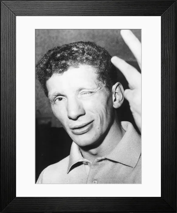 Framed Print : Jackie Brown winks at the camera