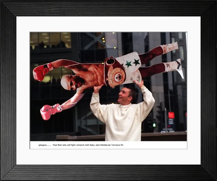 Framed Print : Paul Weir boxer holds cardboard cut out of Baby Jake Matlala who he will fight in a Framed Print : Paul Weir boxer holds cardboard cut out of Baby Jake Matlala who he will fight in a