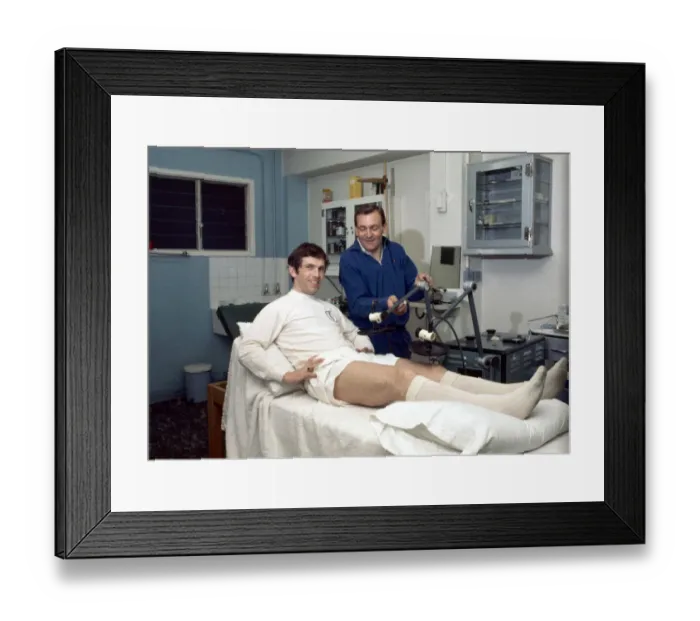 Framed Print : Leeds United footballer Johnny Giles receives tretment on an injury in the physio room