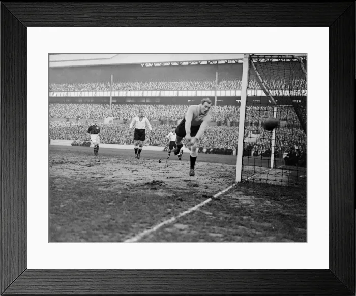 Framed Print : The German goalkeeper, Jacob, in action against England in an international football Framed Print : The German goalkeeper, Jacob, in action against England in an international football