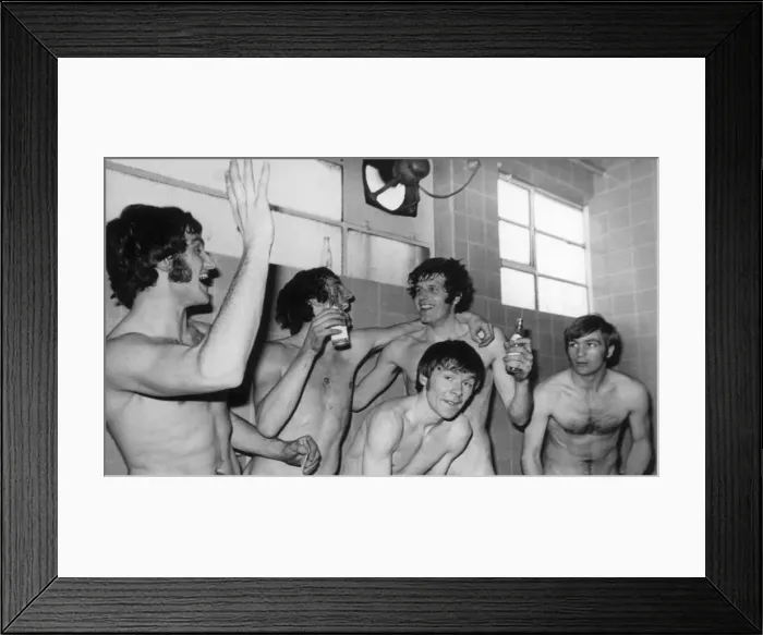 Framed Print : Everton v. Liverpool. Liverpool players enjoy their bath after the game