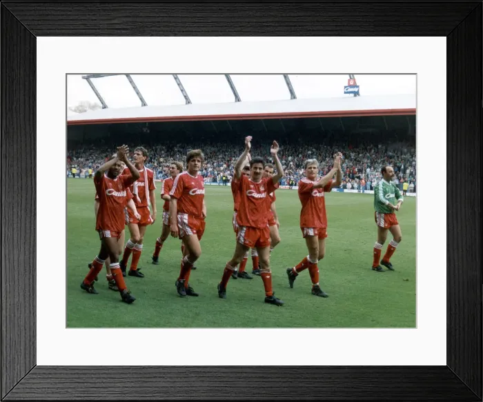 Framed Print : Liverpool players acknowledge their fans and celebrate winning the League Championship