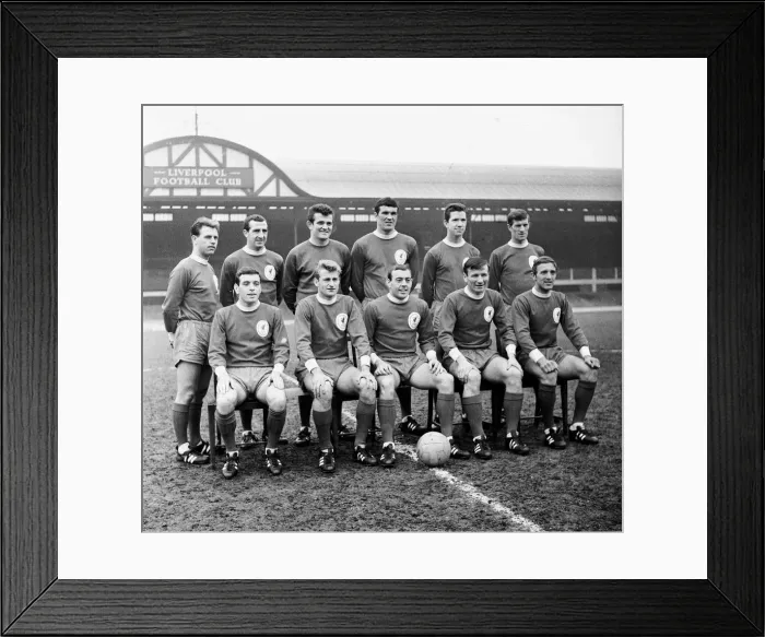 Framed Print : Liverpool team pose for a group picture on the pitch at Anfield before the start of