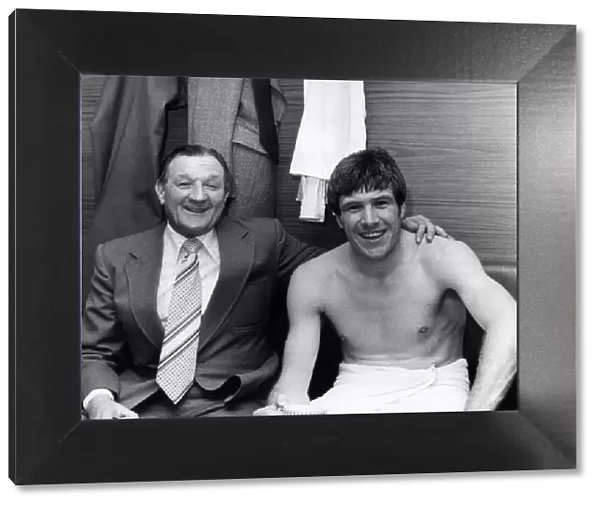 Manager Bob Paisley and Captain Emlyn Hughes celebrate after securing Liverpool