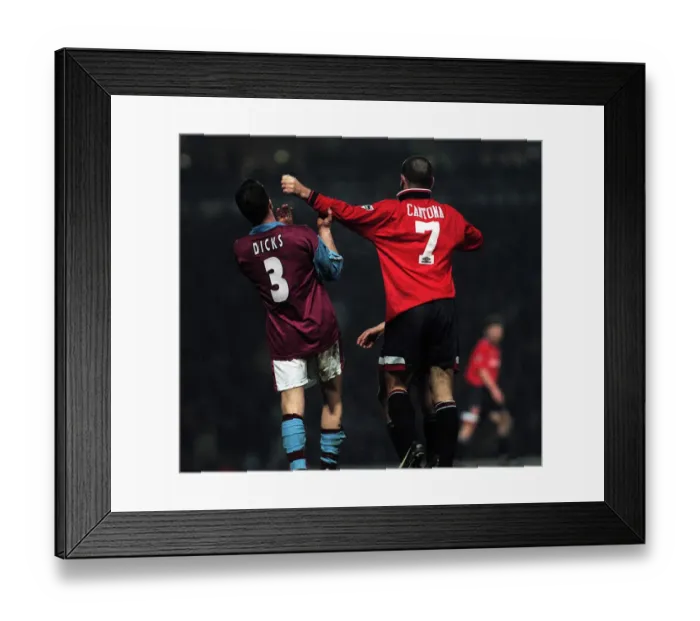 Framed Print : Erica Cantona of Manchester United pushes away West Hams Julian Dicks during the match Framed Print : Erica Cantona of Manchester United pushes away West Hams Julian Dicks during the match
