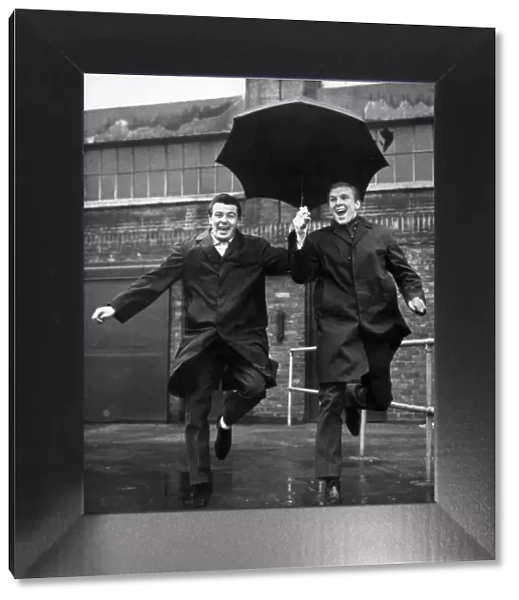 Bobby Moore and Johnny Byrne seen here leaving West Ham