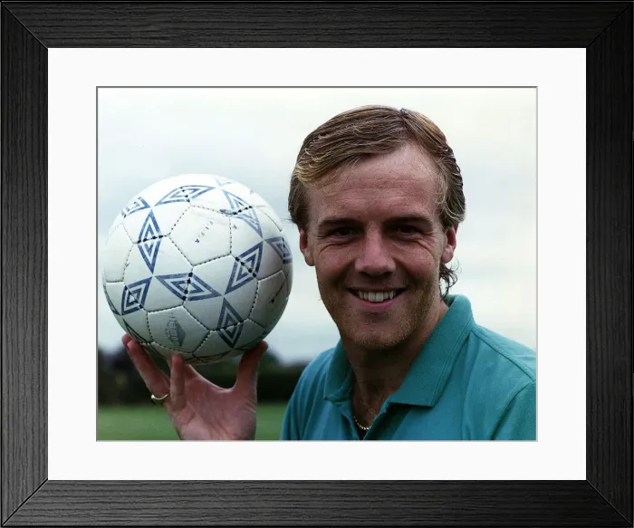 Framed Print : Kerry Dixon, former footballer who played for Chelsea. Holding a football and smiling Framed Print : Kerry Dixon, former footballer who played for Chelsea. Holding a football and smiling