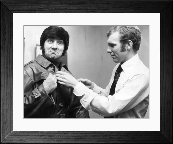 Framed Print : Bobby Moore fits out comediam Jimmy Tarbuck who opens at the Palladium in the pantomime Framed Print : Bobby Moore fits out comediam Jimmy Tarbuck who opens at the Palladium in the pantomime