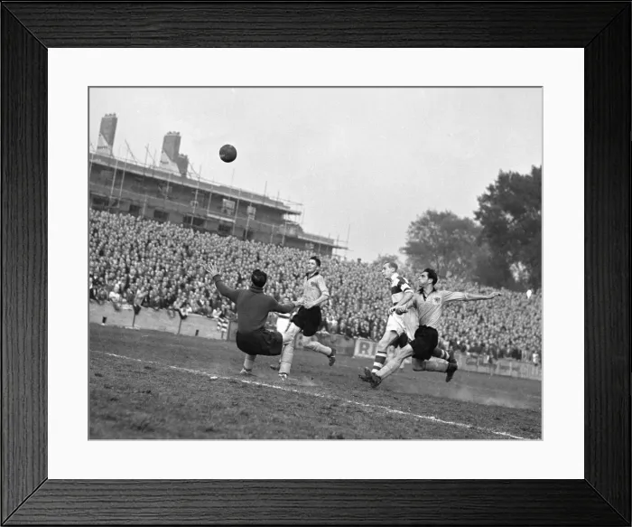 Framed Print : Hull City strikers seen here in a goal mouth melee, try to lob the ball over the Queens