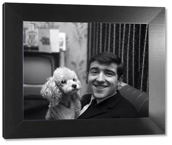 Terry Venables January 1964 at home with his pet poodle