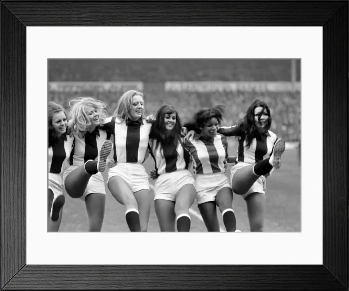 Framed Print : West Bromwich Albion vs. Liverpool. Albions Go-Go girls wearing the junior teamIs