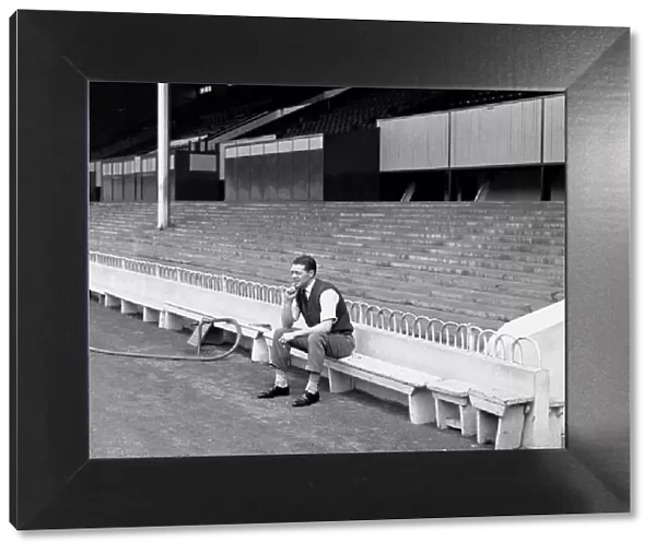 Les Allen of Tottenham Hostpur sitting alone in the ground at White Hart Lane May