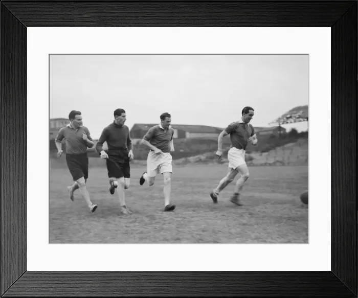 Framed Print : A group of Millwall footballers training the day before the 1945-46 season opens Framed Print : A group of Millwall footballers training the day before the 1945-46 season opens