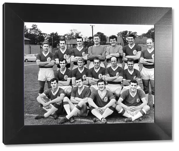 Liverpool team pose for a group photograph at their team training ground