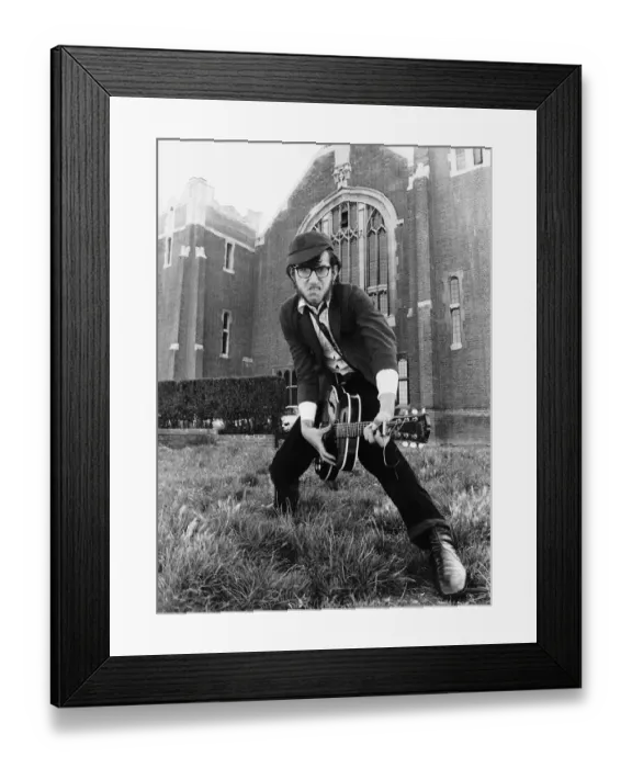 Framed Print : Teenagers Punk Rockers Julian Isaacs Aunty Pus in a punk rock uniform playing guitar