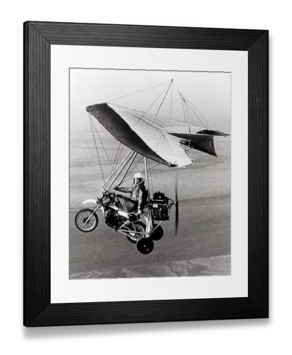 Framed Print : Microlight Aircraft Motorbike. Test pilot Geoff Ball flies Framed Print : Microlight Aircraft Motorbike. Test pilot Geoff Ball flies