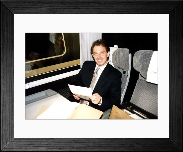 Framed Print : Tony Blair leader of the Labour Party onboard a train. July 1994 Framed Print : Tony Blair leader of the Labour Party onboard a train. July 1994