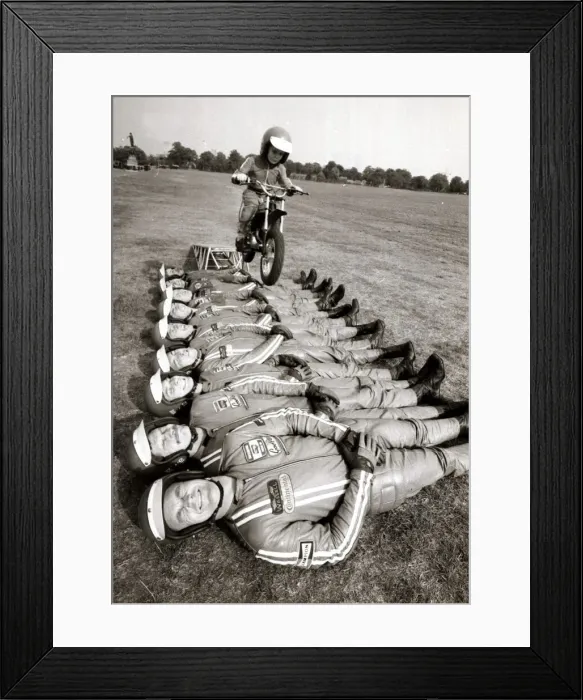 Framed Print : Little John Shipley leaps over 9 men on his motorcycle - 1976 Motor Cycles - Stunts