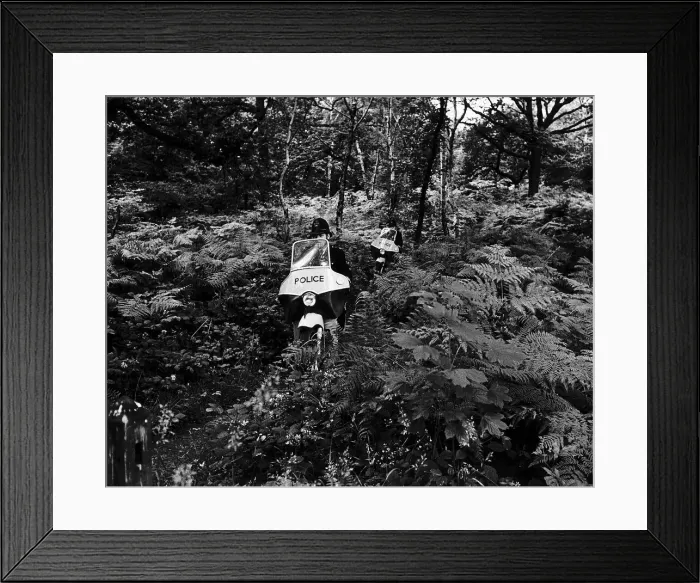 Framed Print : Police Searching for a cheetah or leopard through four and a half square miles of