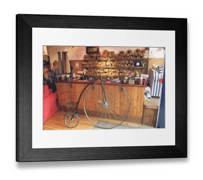 Framed Print : A penny farthing bicycle in Charlottes store in Marble Arch London owned by Martin Framed Print : A penny farthing bicycle in Charlottes store in Marble Arch London owned by Martin