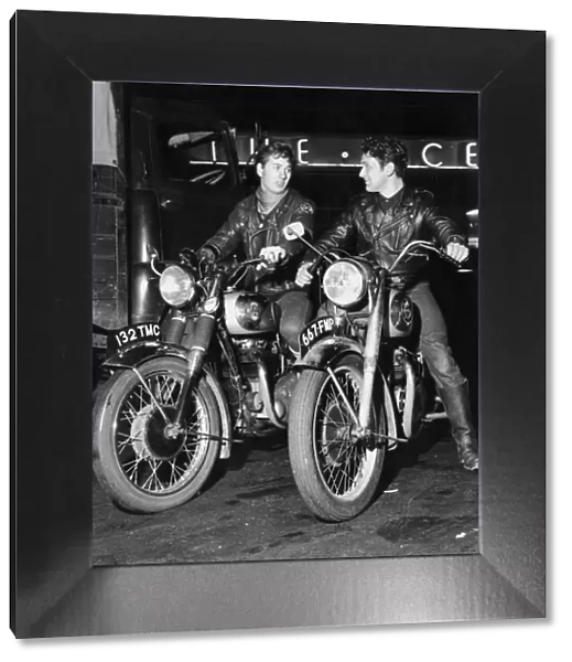 Youth Culture Mod and Rockers October 1963 Two Rockers sit on their motor Bike