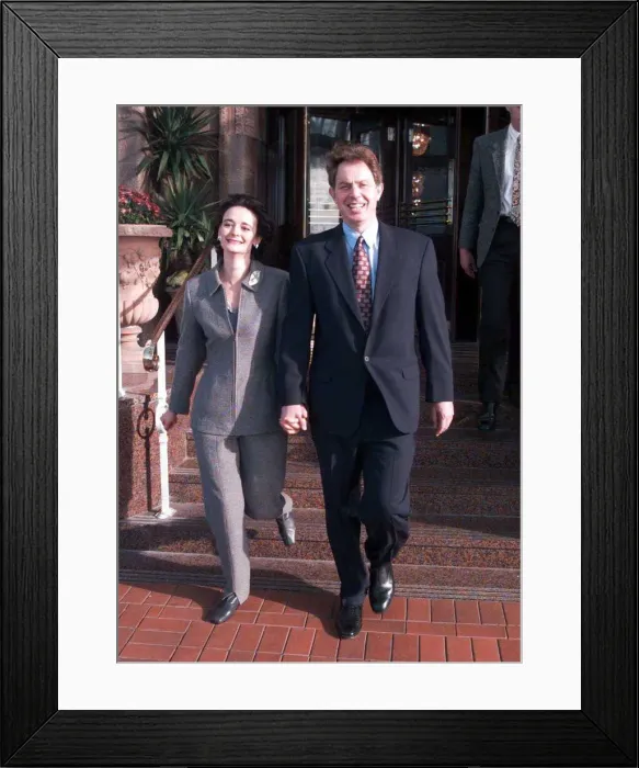 Framed Print : Tony Blair Labour Leader MP and wife Cherie Booth leave their hotel together. 1995 Framed Print : Tony Blair Labour Leader MP and wife Cherie Booth leave their hotel together. 1995