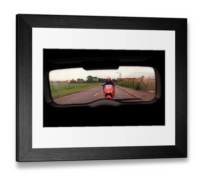 Framed Print : Green Vauxhall Astra van July 1999 with red Honda motorbike