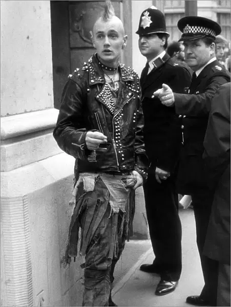 Youth Punks September 1984 Policemen tells punks where to go outside the Bank of